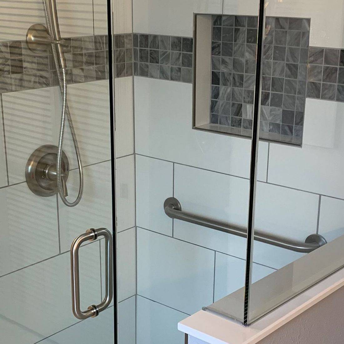 Accessible shower with a grab bar
